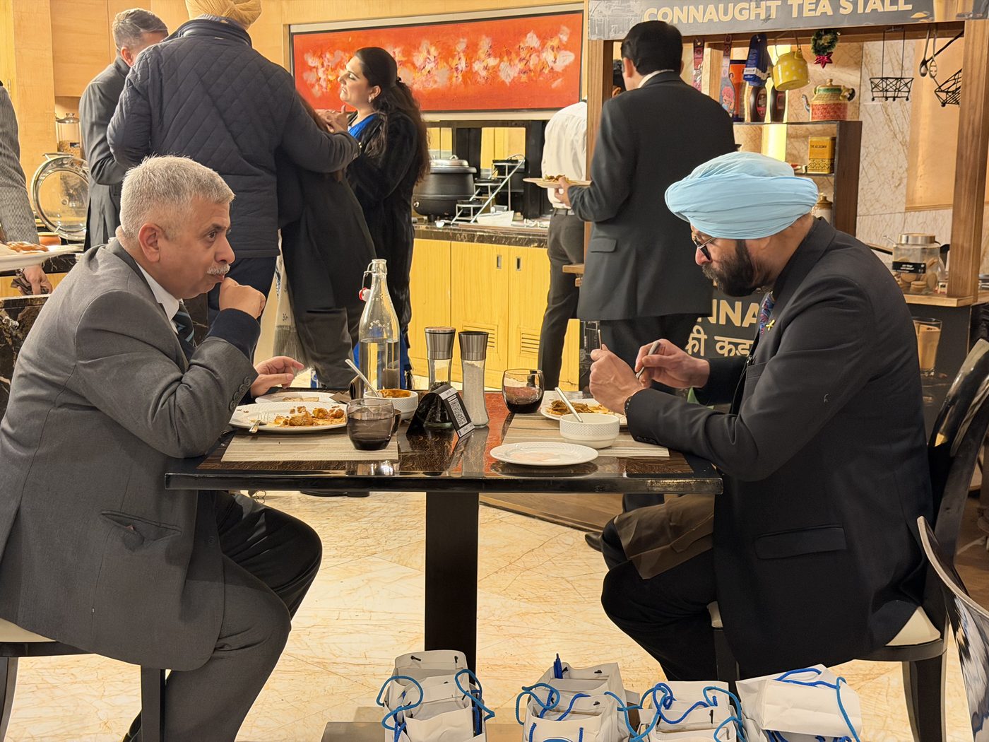 Members talking over a networking breakfast